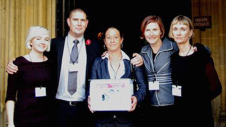 Team at HoL with petition.jpg