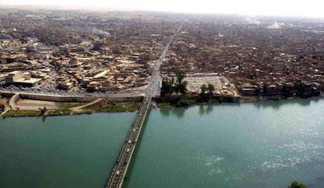 Tigris River and bridge in Mosul. US Army Photo/Michael Bracken. Public Domain.