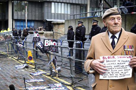 A &#x27;Stop the War&#x27; demonstrator calls for Blair to be prosecuted for war crimes. Photo: lewishamdreamer. Flickr. CC