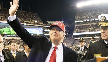 President Donald J. Trump waves to the crowd as he departs the 120th Army-Navy football game at Lincoln Financial Field in Philadelphia, Pa., 14 December 2019