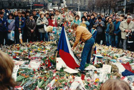 Vaclav Havel laying flowers at a peaceful protest in Czechoslovakia in 1989. 