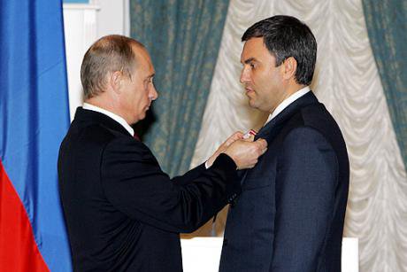 Putin awards Vyacheslav Volodin with a medal for 'Services to the Fatherland' in 2006.