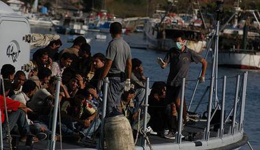 Undocumented migrants arriving by sea at Italian coast
