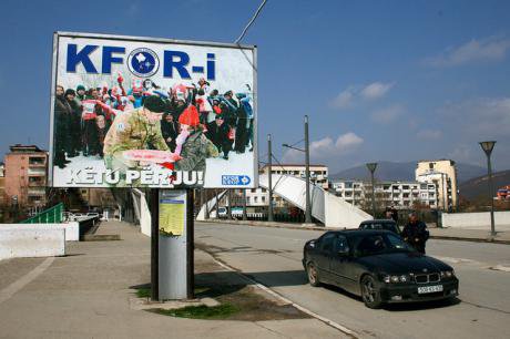 policeman stops car Mitrovica.jpg
