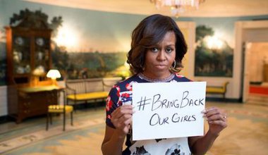 Michelle Obama holds #bringbackourgirls sign