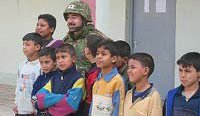 Japanese soldier with Iraqi children