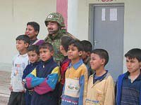 Japanese soldier with Iraqi children